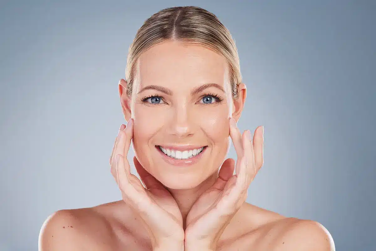 happy skincare and portrait of woman in studio for facial cosmetics and natural makeup